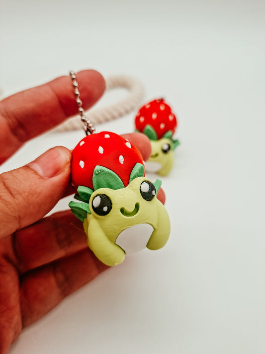 3D-gedruckter Erdbeer-Frosch Fidget Klicker mit liebevollem Design.