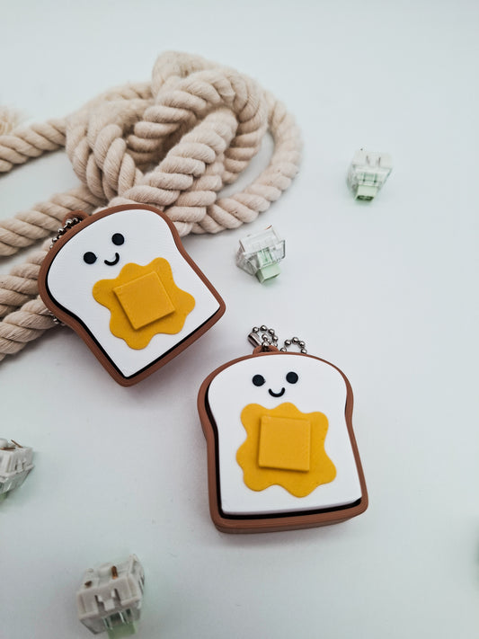 Toast mit Butter Klicker – Niedlicher Fidget Schlüsselanhänger für Stressabbau & Fokus