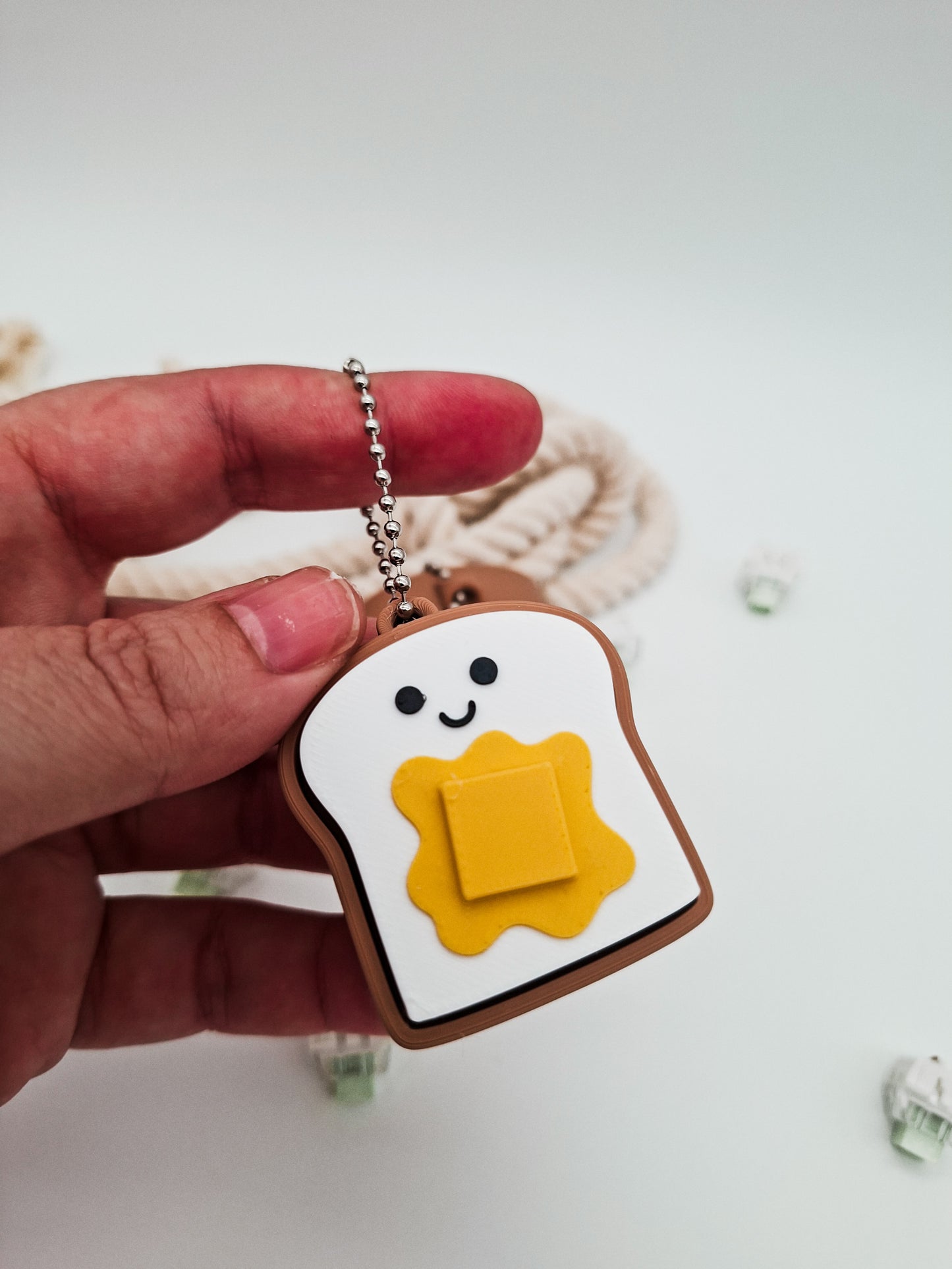 Toast mit Butter Klicker – Niedlicher Fidget Schlüsselanhänger für Stressabbau & Fokus
