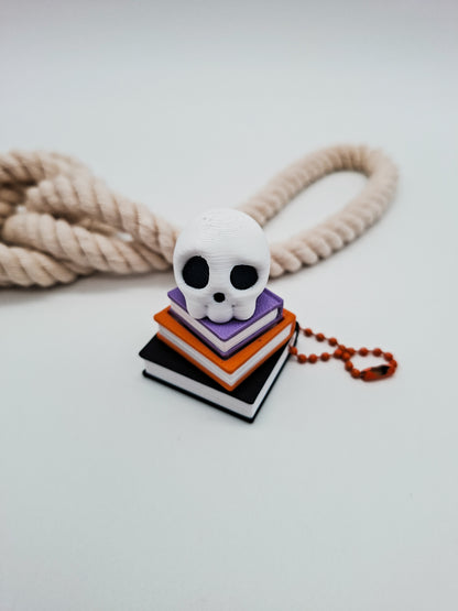 Skull Books Clicker – Spooky Bücherstapel Fidget Schlüsselanhänger