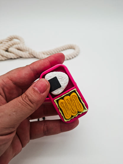 3D-gedruckter Mini-Lunchbox Fidget Klicker mit liebevollem Design.