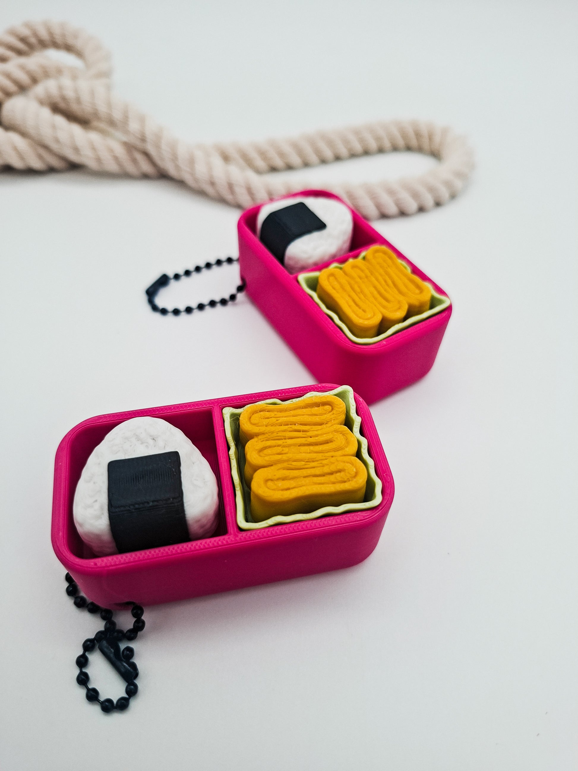 3D-gedruckter Mini-Lunchbox Fidget Klicker mit liebevollem Design.