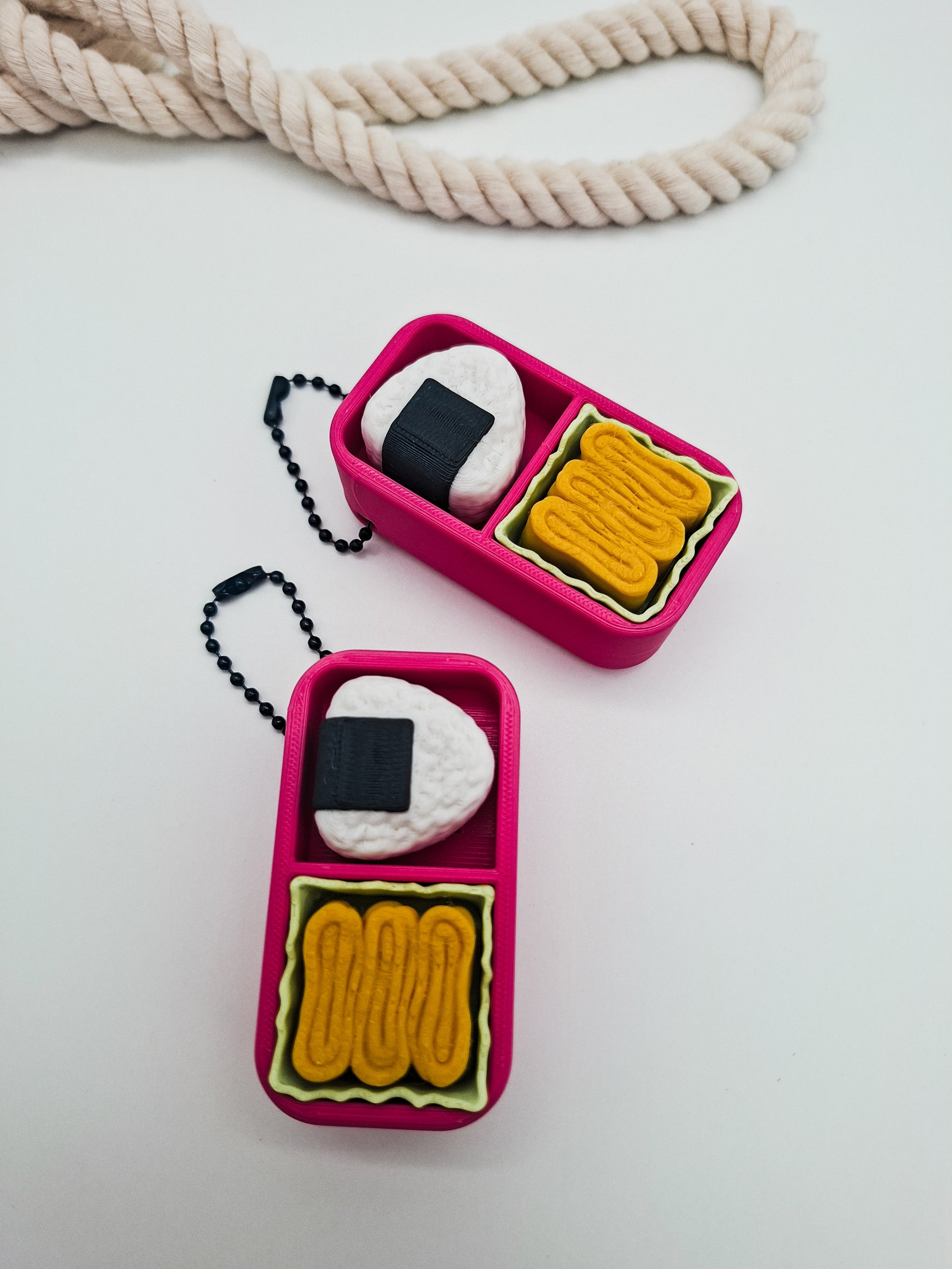 3D-gedruckter Mini-Lunchbox Fidget Klicker mit liebevollem Design.