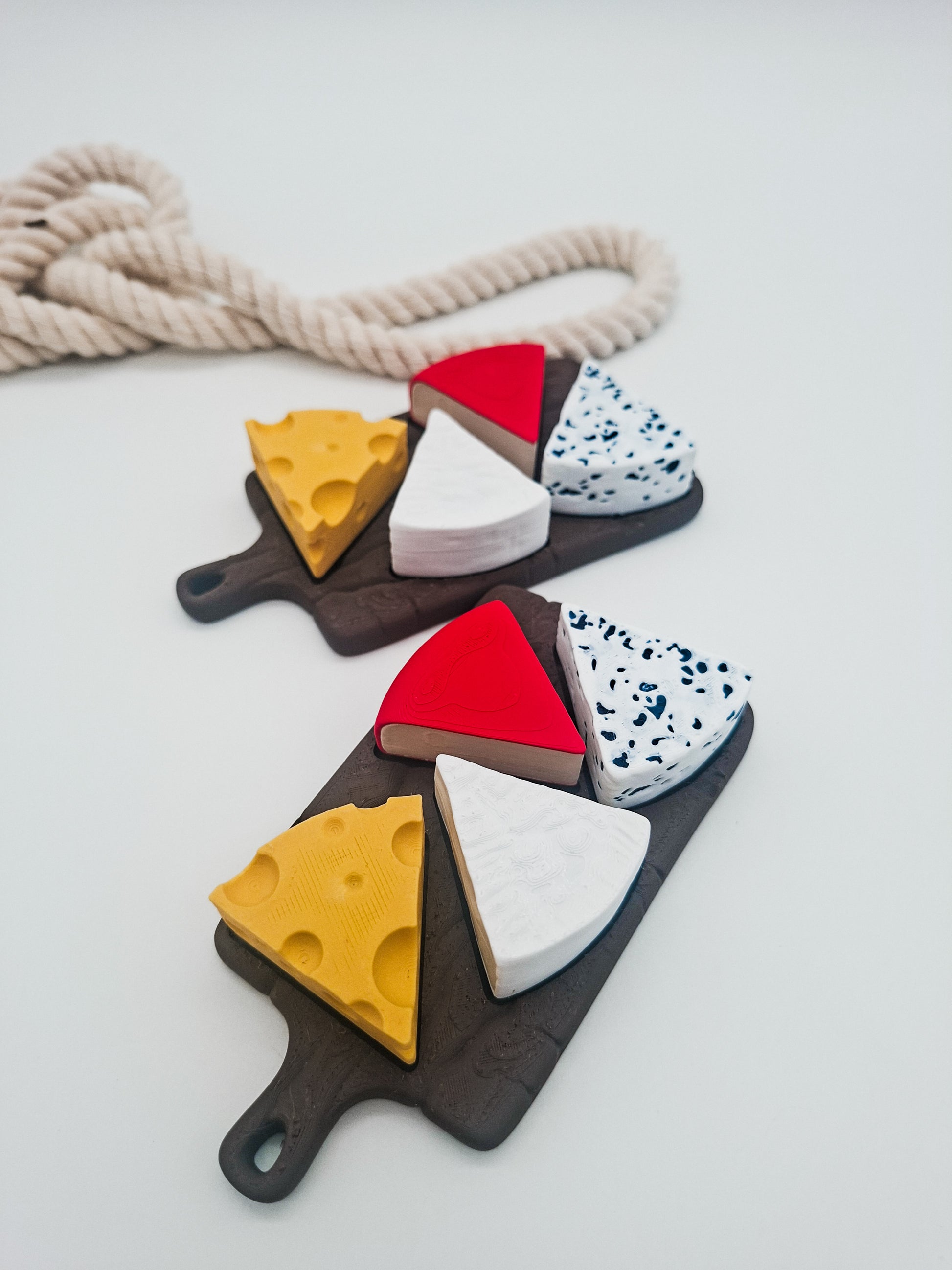 3D-gedruckter Käseplatten Fidget Klicker mit liebevollem Design.