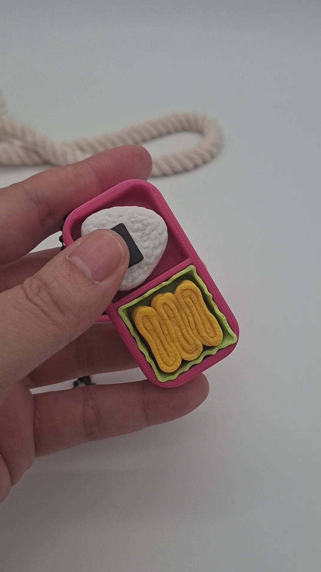 3D-gedruckter Mini-Lunchbox Fidget Klicker mit liebevollem Design.