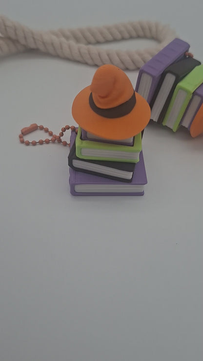 3D-gedruckter Bücherstapel mit Hut Fidget Klicker mit liebevollem Design.